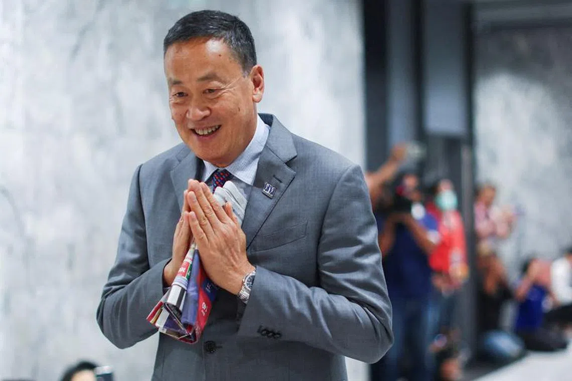 FILE PHOTO: Pheu Thai's Srettha Thavisin gestures at the party headquarters before a royal endorsement ceremony after Thailand's parliament voted in favour of his prime ministerial candidacy, in Bangkok, Thailand August 23, 2023. REUTERS/Athit Perawongmetha/File Photo