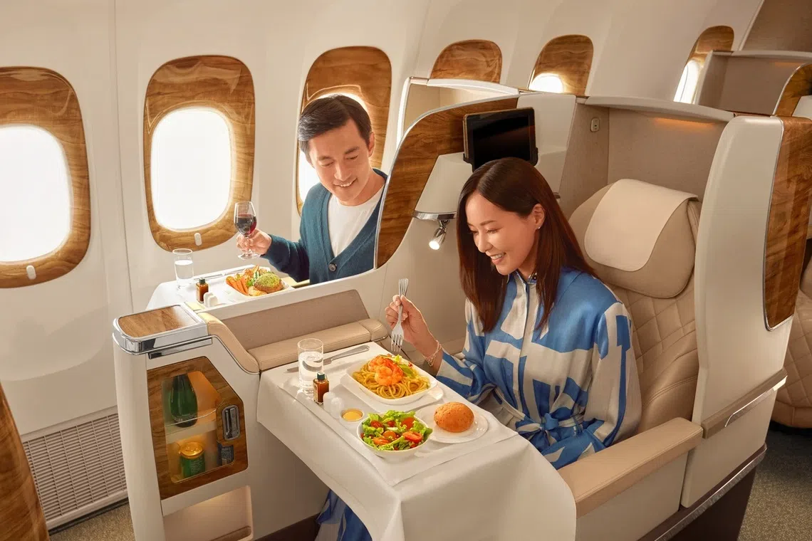 Travellers in Premium Class are served chef-designed menus and a selection of wines and Champagne chosen to complement the flavours at altitude.