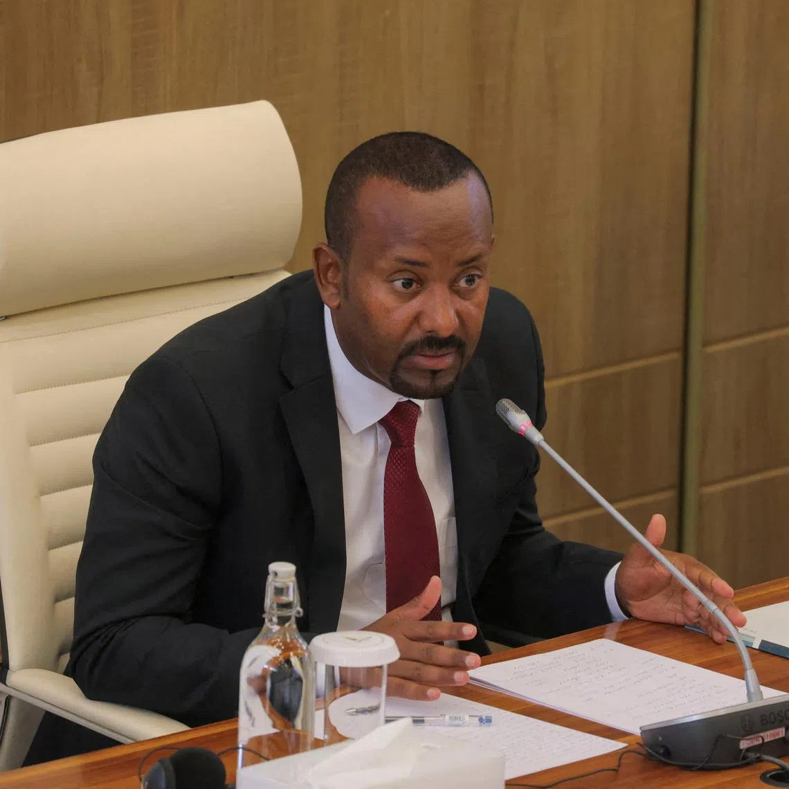 FILE PHOTO: Ethiopia's Prime Minister Abiy Ahmed addresses parliament members on the current situation of the country at the parliament building in Addis Ababa, Ethiopia, March 20, 2025. REUTERS/Tiksa Negeri/File Photo