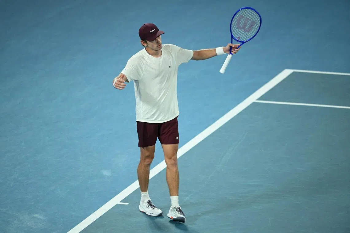 Tennis - Australian Open - Melbourne Park, Melbourne, Australia - January 27, 2026 Australia's Alex De Minaur reacts during his quarter final match against Spain's Carlos Alcaraz REUTERS/Jaimi Joy