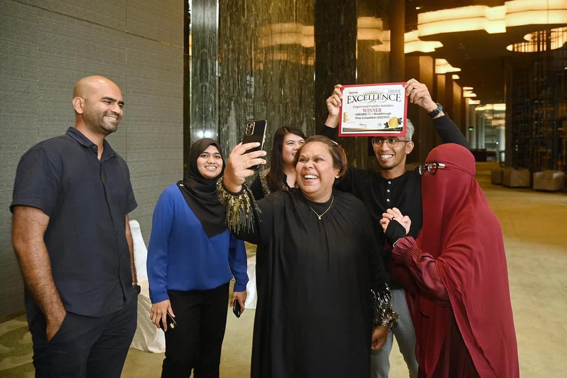 The team behind the Empowered Families Initiative, which offers families living in public rental flats money to use in a way they themselves believe will work to improve their lot.