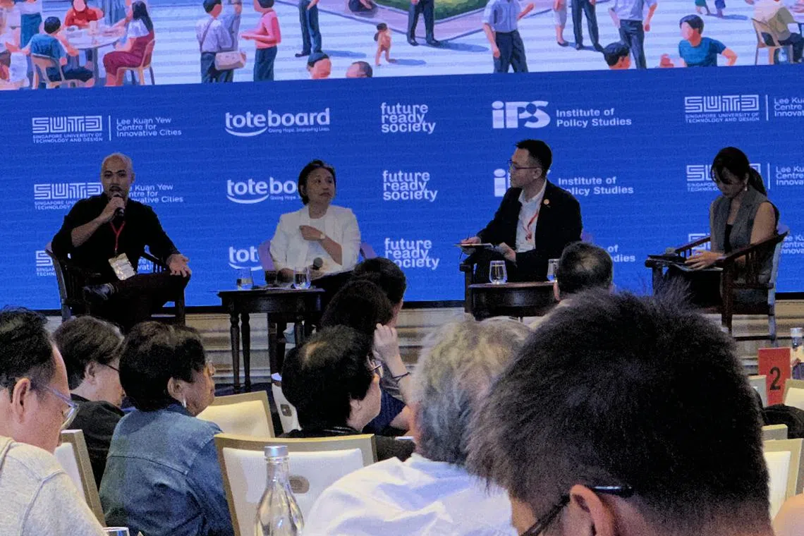 EM Services (Town Council) general manager Wee Keng Boon (far left) speaking at a panel discussion alongside Ms Karen Lee, director (partnership lab) at National Youth Council, and Mr Vincent Ng, founding member of A Good Space. Dr Suhaila Zainal Shah, a research fellow at the Lee Kuan Yew Centre for Innovative Cities (far right) was moderating the discussion.