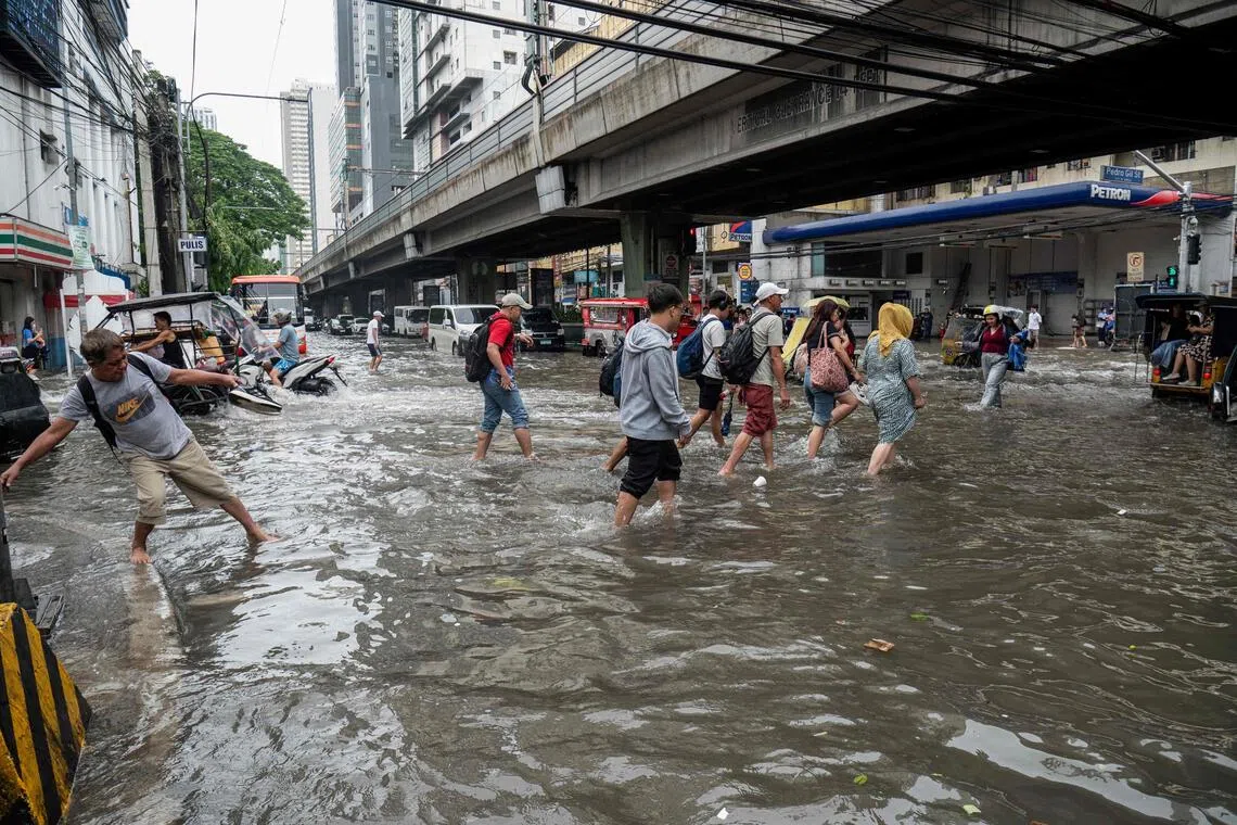 Philippines says 12 dead due to landslides, floods