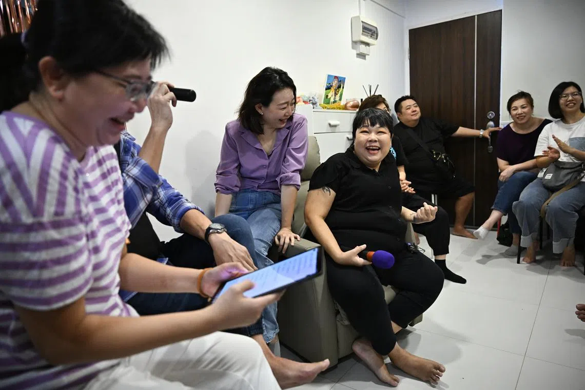 Friends singing during the Living Funerals: A Celebration of Life event for Ms Carolyn Too. 