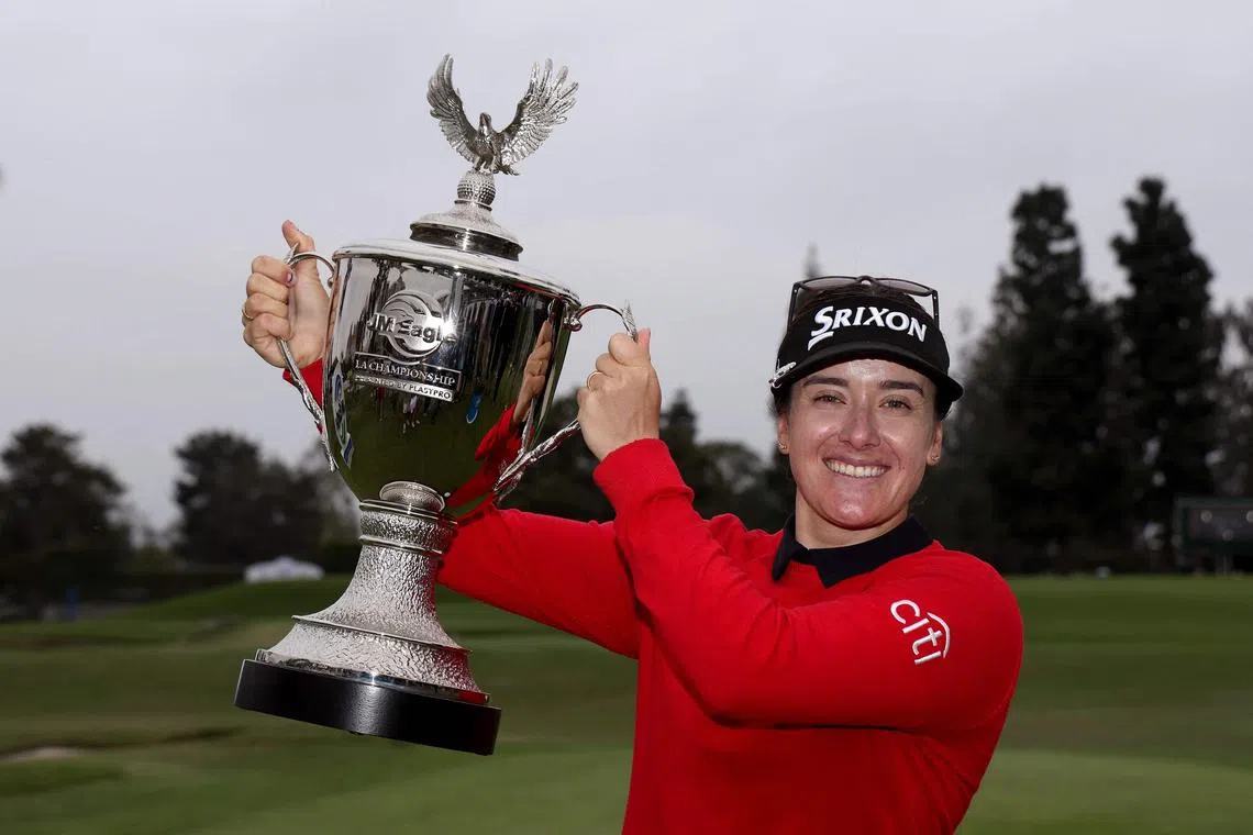 Hannah Green of Australia poses with the trophy after winning the LA Championship.