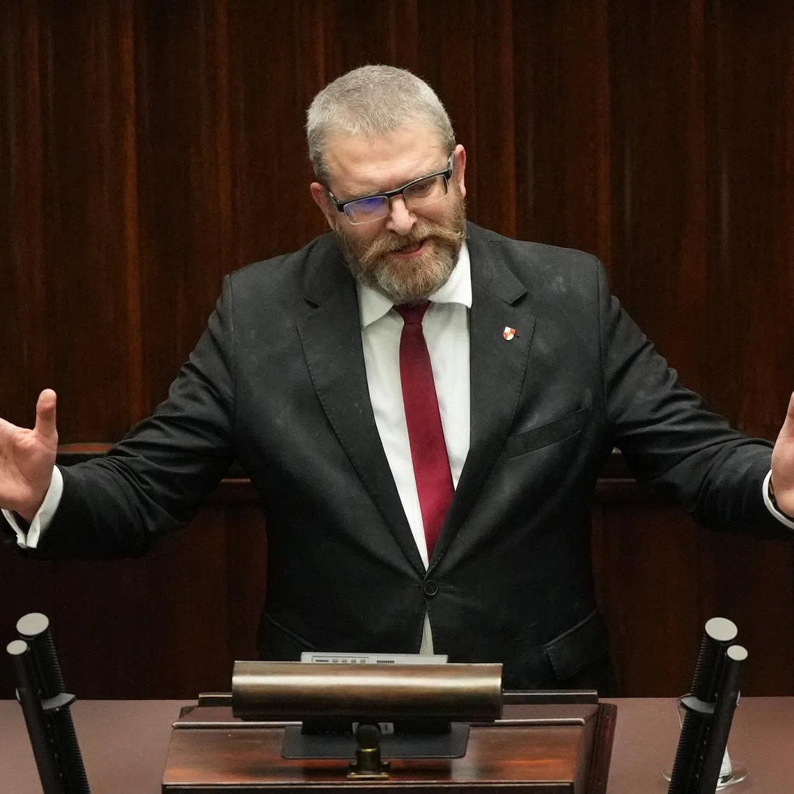Grzegorz Braun, member of far-right political alliance Confederation, speaks during a session at the Parliament in Warsaw, Poland December 12, 2023. REUTERS/Aleksandra Szmigiel/File Photo