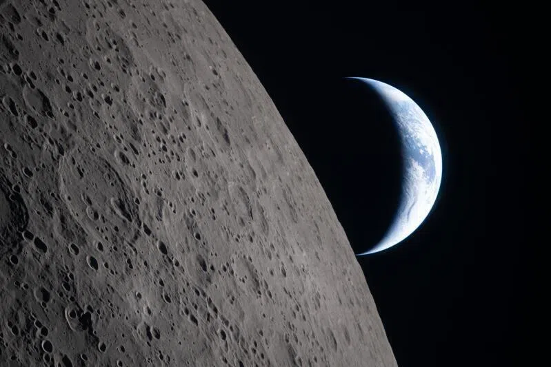 A new perspective: Earth seen as a crescent to the Moon,  an image taken by NASA astronauts on the Artemis II mission.
