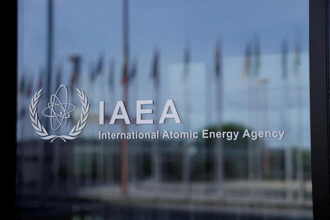 FILE PHOTO: The logo of the International Atomic Energy Agency (IAEA) is seen at its headquarters before an emergency meeting at the request of both Ukraine and Russia, to discuss attacks on the Zaporizhzhia nuclear power plant, after both countries accused each other of drone attacks, in Vienna, Austria April 11, 2024. REUTERS/Leonhard Foeger/File Photo