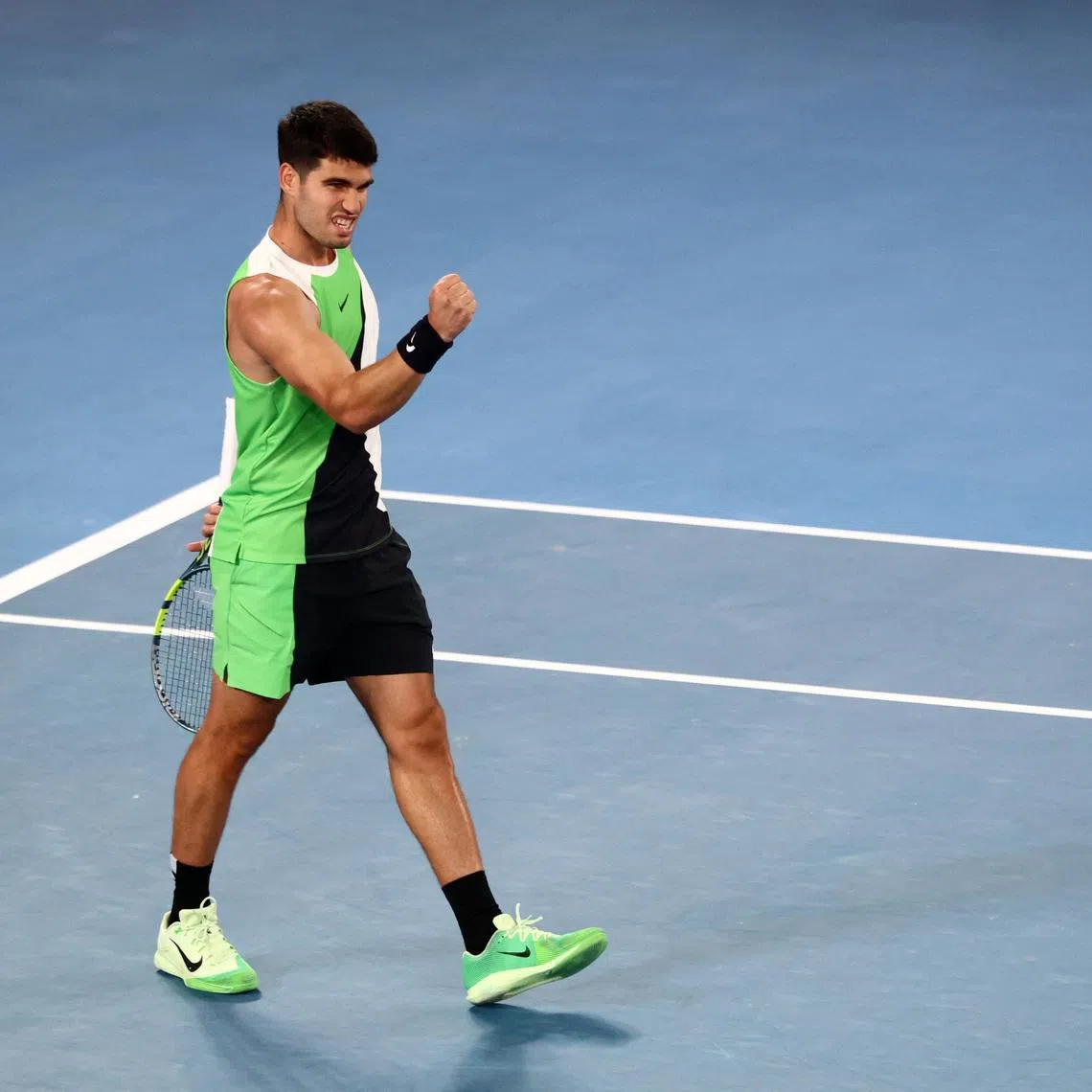 Tennis - Australian Open - Melbourne Park, Melbourne, Australia - January 18, 2026 Spain's Carlos Alcaraz celebrates winning his first round match against Australia's Adam Walton REUTERS/Tingshu Wang