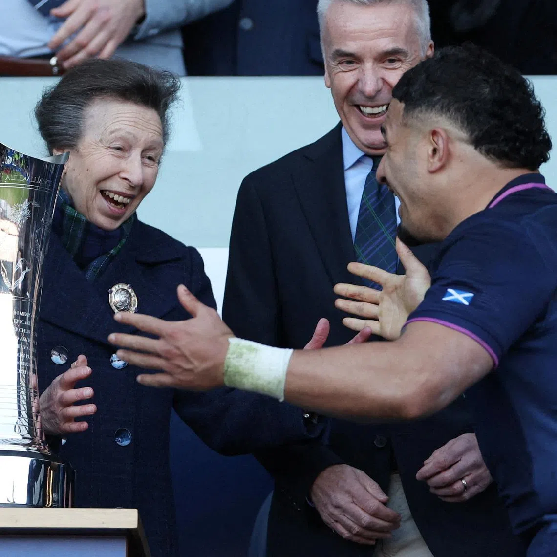 Rugby Union - Six Nations Championship - Scotland v France - Murrayfield Stadium, Edinburgh, Scotland, Britain - March 7, 2026 Scotland's Sione Tuipulotu celebrates with Anne, Princess Royal before lifting the Auld Alliance Trophy after winning their Six Nations Championship match against France REUTERS/Russell Cheyne