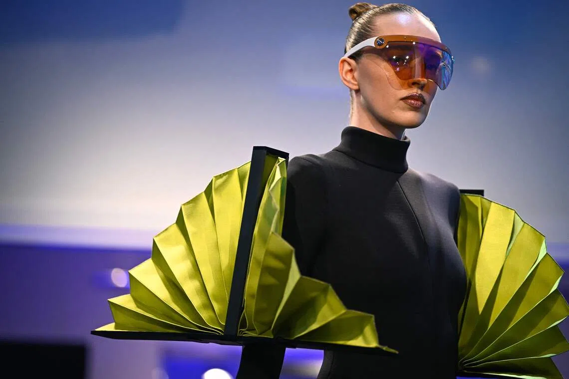 A model presenting a creation by Pierre Cardin for the Women Ready-to-wear Spring-Summer 2026 collection as part of the Paris Fashion Week, in Paris, on Oct 7, 2025. 