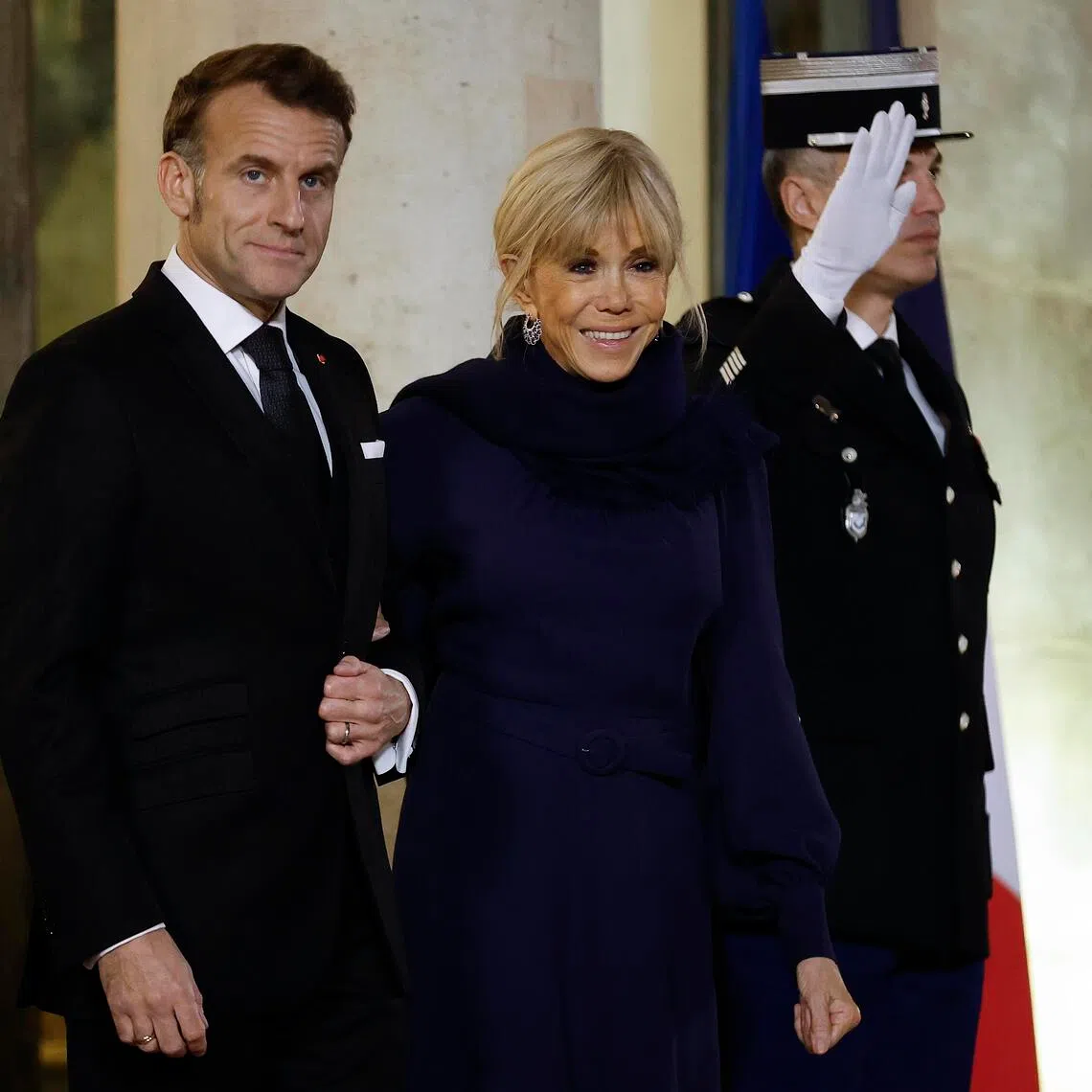 French President Emmanuel Macron and his wife Brigitte Macron, who has triggered a feminist backlash with her comment against activists.