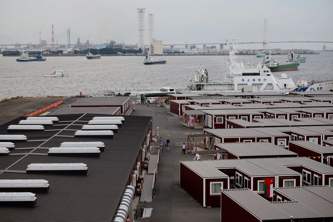 Unlike at past Games, there was no traditional athletes’ village in a bid to save money. Participants stayed on a cruise ship, in hotel rooms and in temporary wooden huts (above).