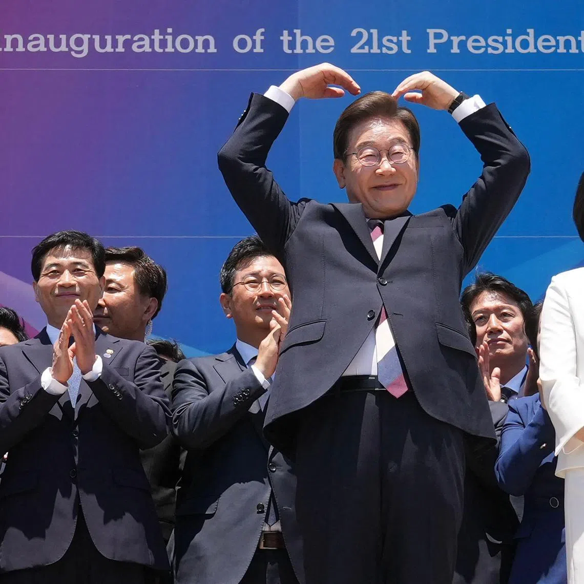 South Korean new President Lee Jae-myung (centre) and his wife Kim Hye-kyung after attending the Presidential Inauguration at the National Assembly in Seoul, on June 4.