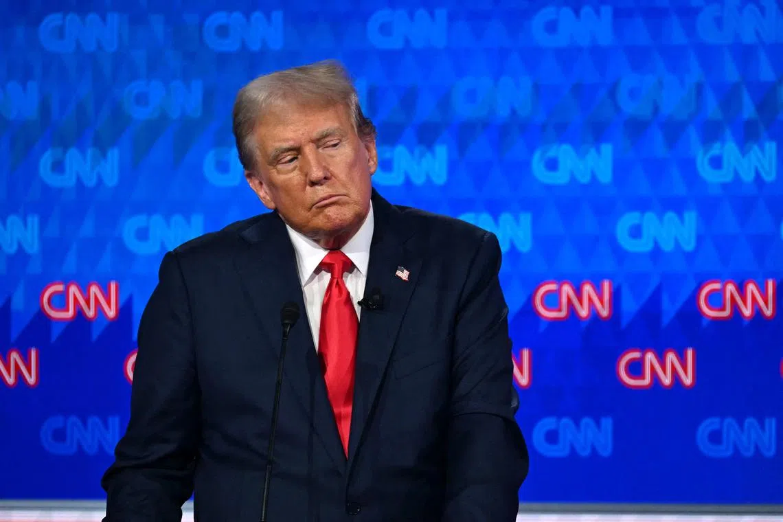 Former US President and Republican presidential candidate Donald Trump leaves the stage during a commercial break as he participates in the first presidential debate of the 2024 on June 27. 