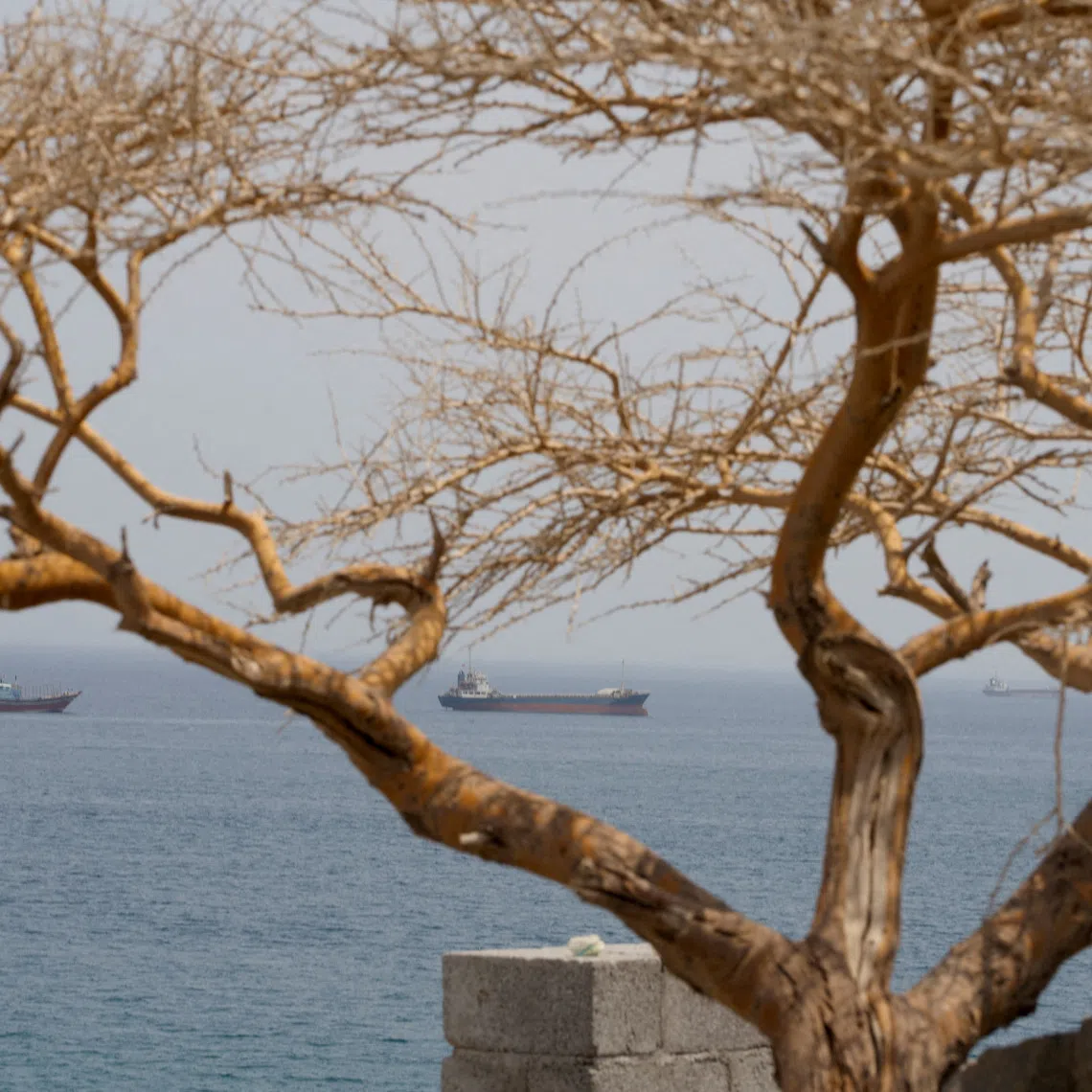 Vessels near the Strait of Hormuz, as seen from Musandam, Oman on Aug 10.