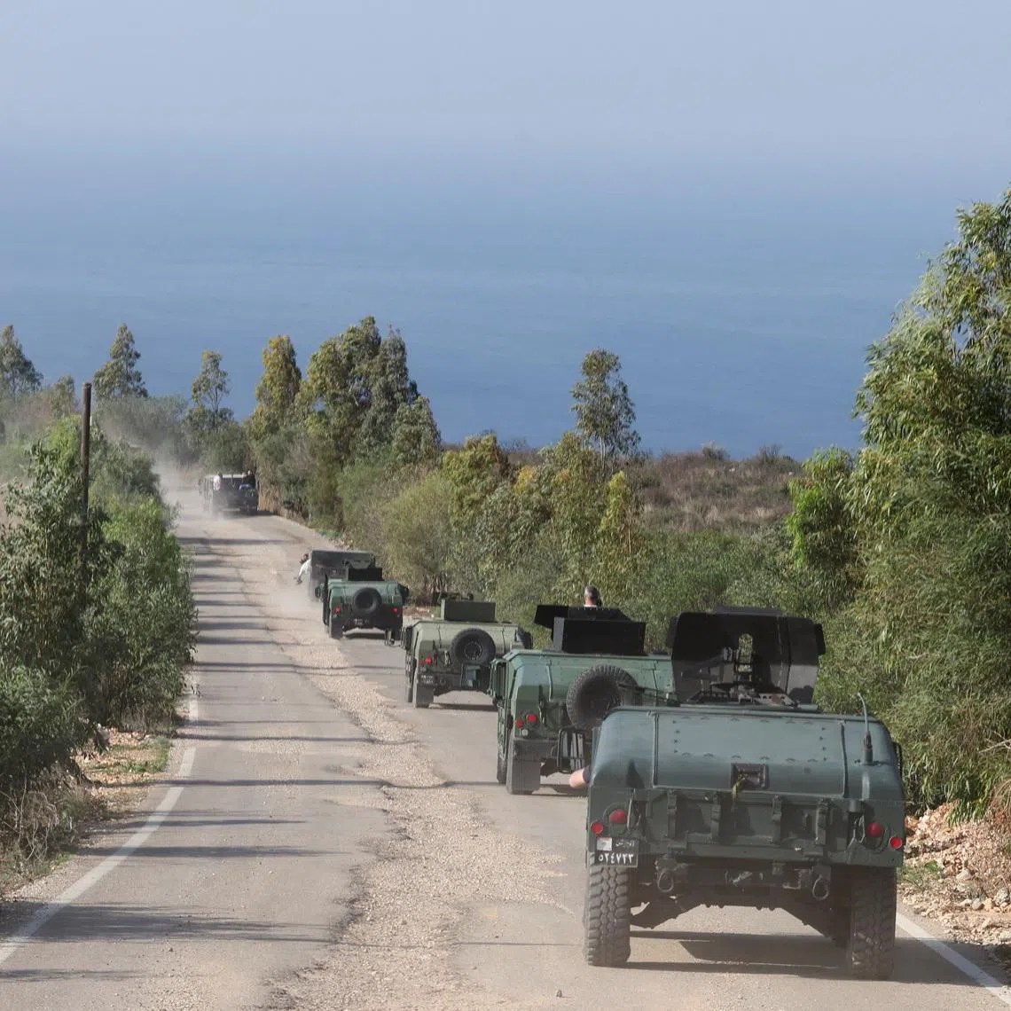 Lebanese army members drive military vehicles during a Lebanese army media tour, to review the army's operations in the southern Litani sector, in Naqoura, near the border with Israel, southern Lebanon, November 28, 2025. REUTERS/Aziz Taher/File Photo