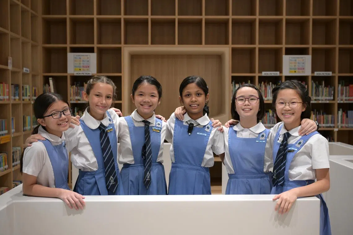 A group of Primary 5 children, two of whom have hearing loss, are close friends who have learnt and played together in CCPS. 