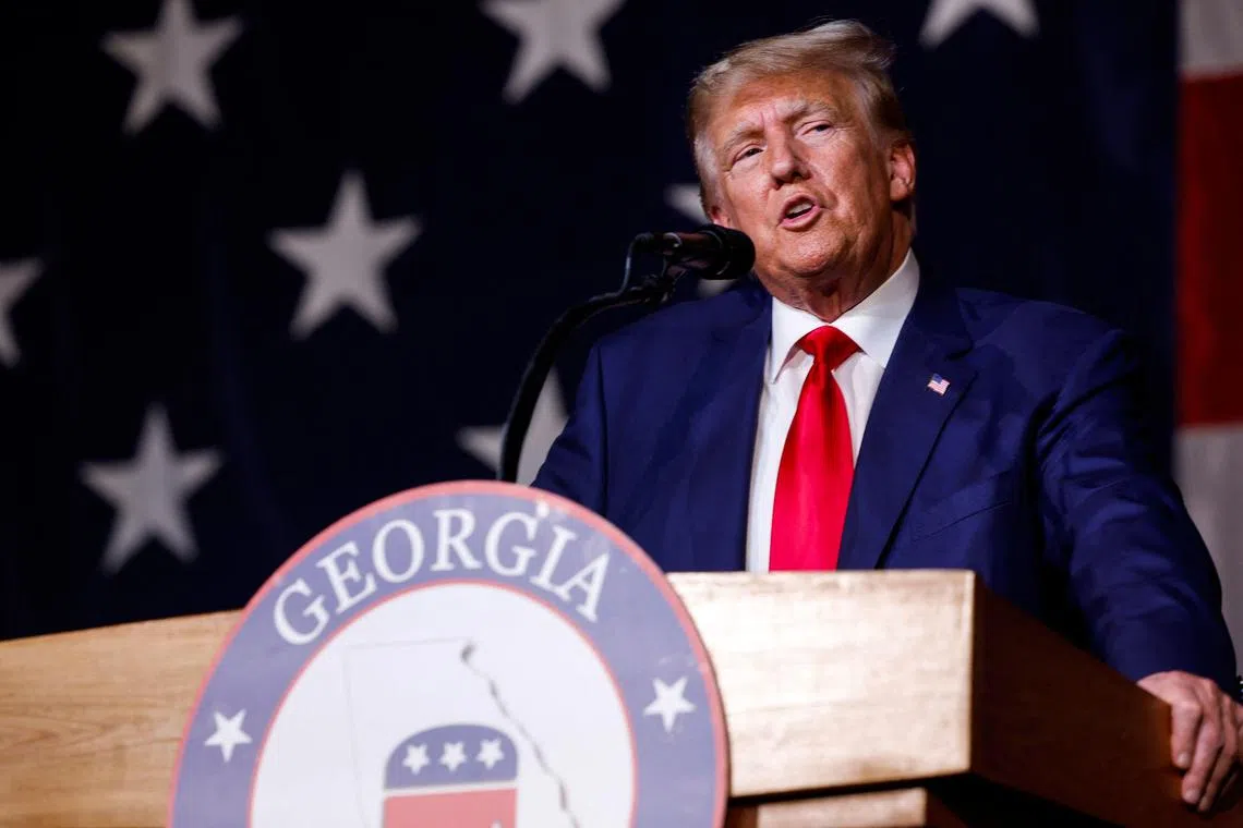 Trump said at a Republican convention in Georgia (above) that US President Joe Biden had orchestrated the criminal charges to undermine his presidential campaign.