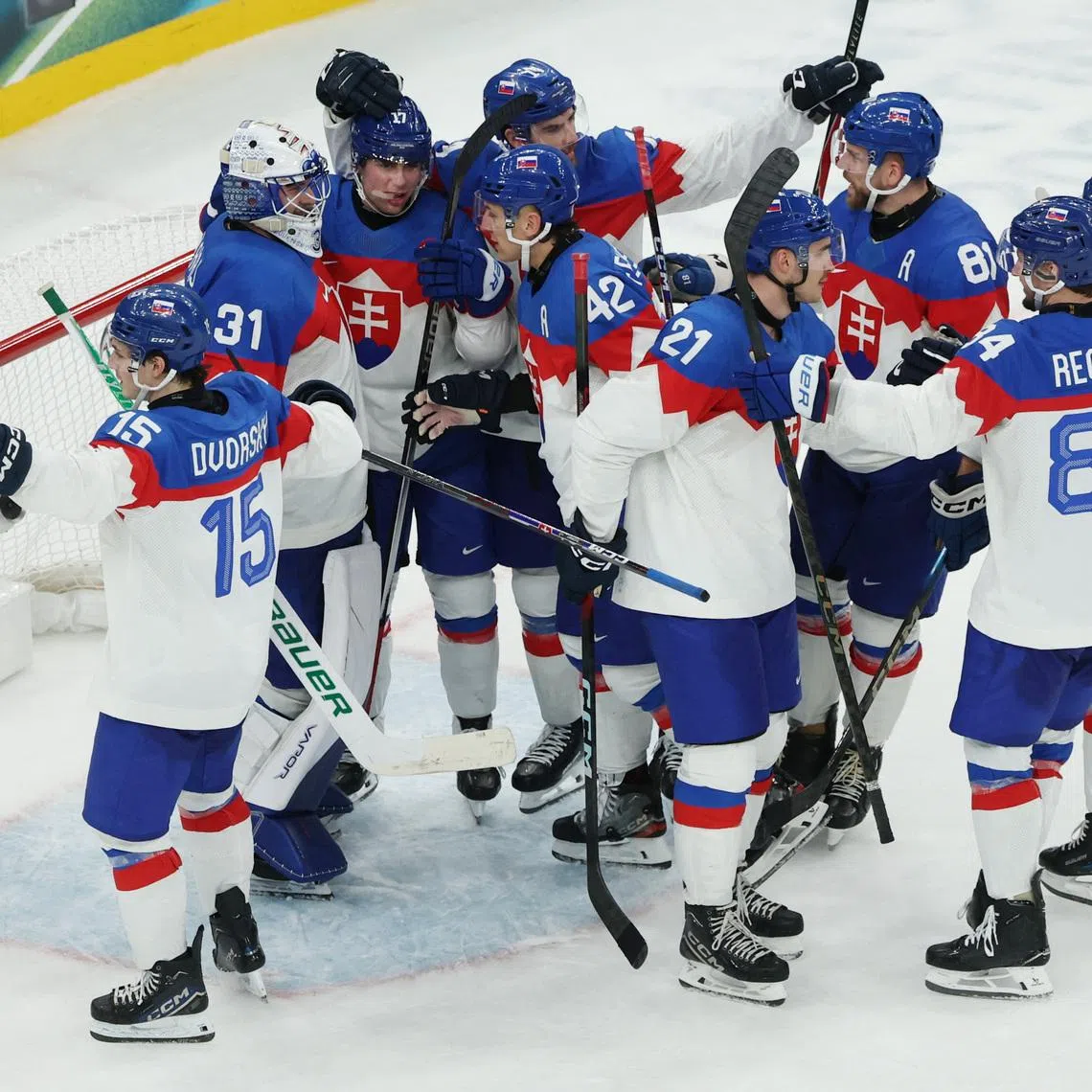 Milano Cortina 2026 Olympics - Ice Hockey - Men's Preliminary Round - Group B - Sweden vs Slovakia - Milano Santagiulia Ice Hockey Arena, Milan, Italy - February 14, 2026. Slovakia players react after the match REUTERS/Mike Segar