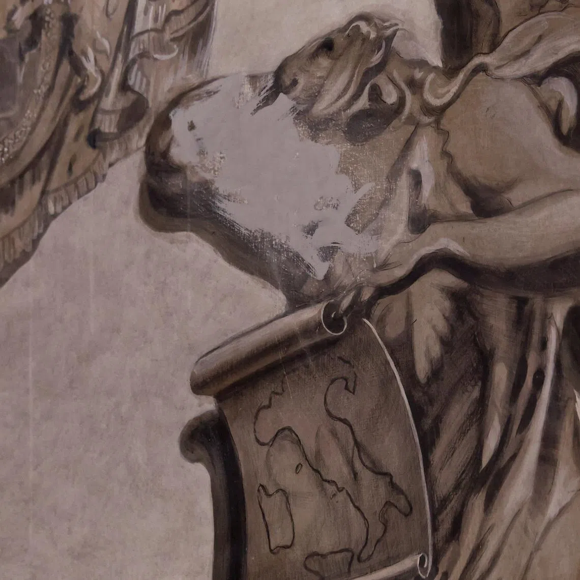 An apparent likeness of Italian Prime Minister Giorgia Meloni on an angel fresco painting is covered, after sparking political and clerical controversy, inside the Basilica of St. Lawrence in Lucina, Rome, Italy, February 4, 2026. REUTERS/Remo Casilli