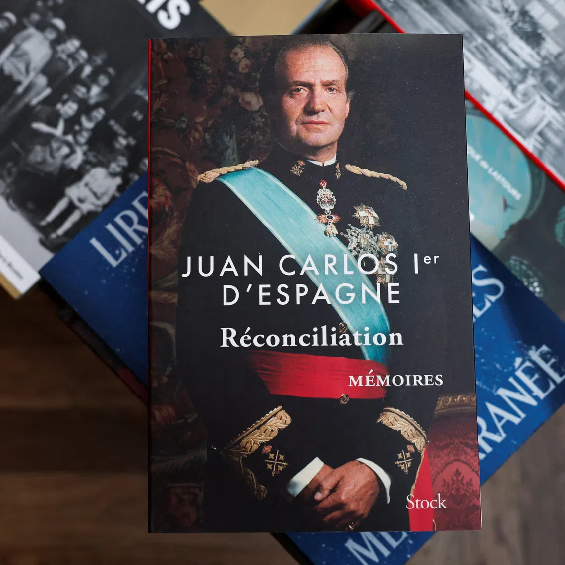 Copies of the book \"Reconciliation\" written by former King Juan Carlos I of Spain, inside the Galignani bookstore in Paris, France, November 5, 2025. REUTERS/Benoit Tessier