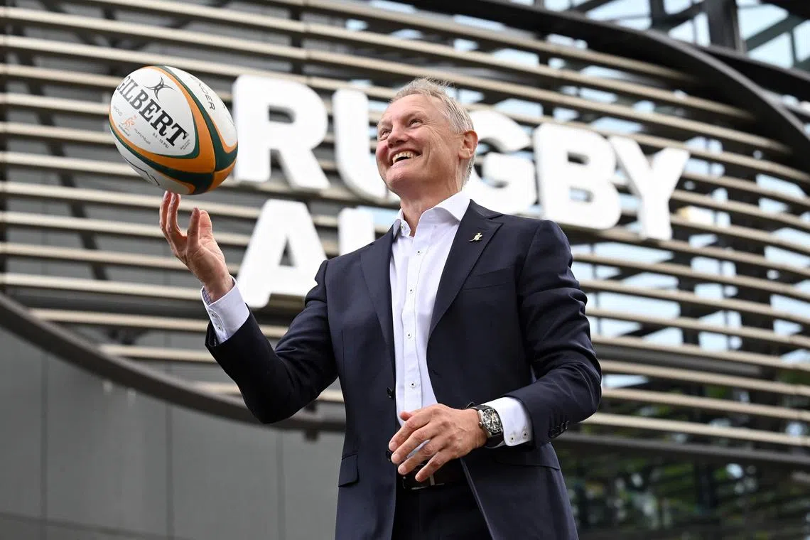 Newly appointed Rugby Australia head coach Joe Schmidt posing for pictures in front of the Rugby Australia head office in Sydney on Jan 19. The New Zealander officially starts on March 1. 