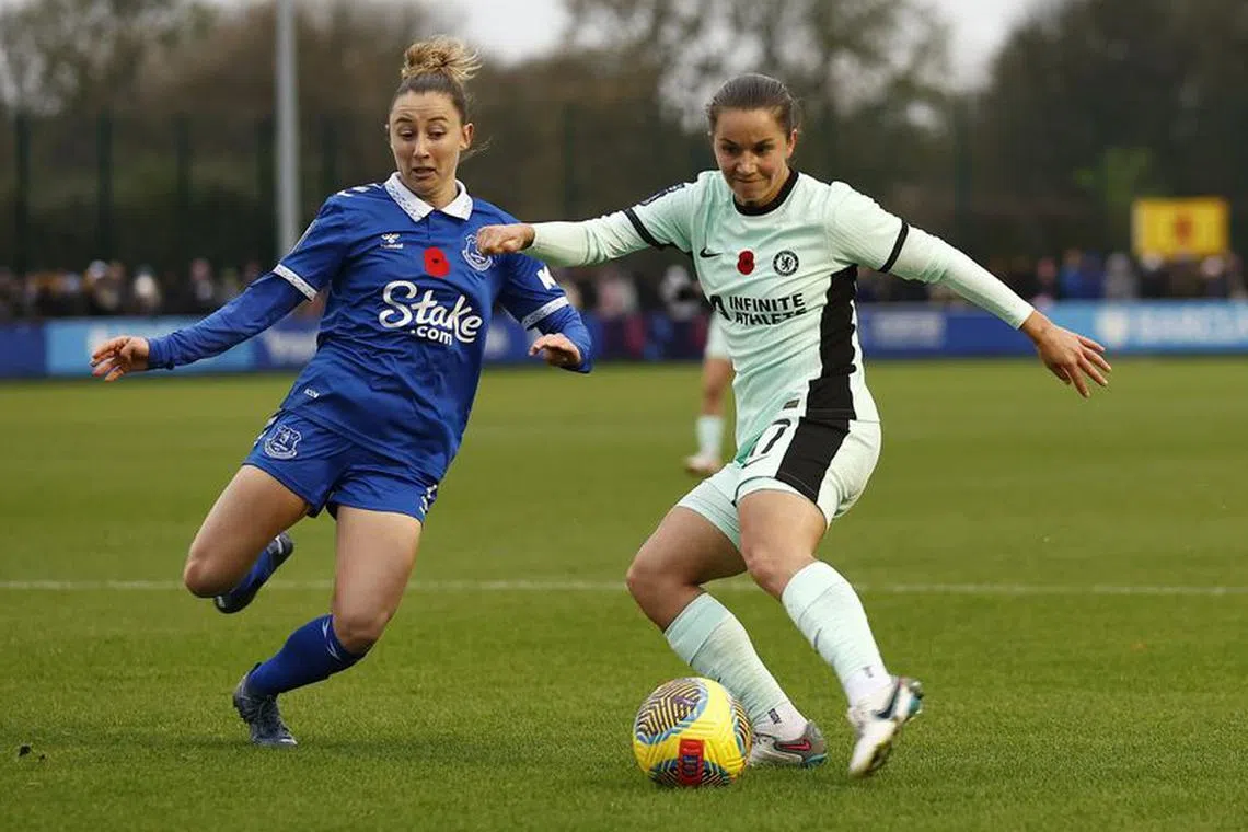 Soccer Football - Women's Super League - Everton v Chelsea - Walton Hall Park, Liverpool, Britain - November 12, 2023 Chelsea's Jessie Fleming in action with Everton's Clare Wheeler Action Images via Reuters/Jason Cairnduff