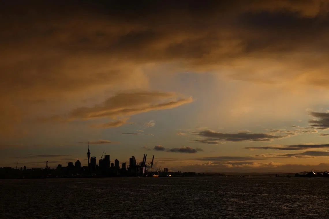 FILE PHOTO: The Auckland skyline is seen at sunset, New Zealand, August 12, 2023. REUTERS/Molly Darlington/File Photo