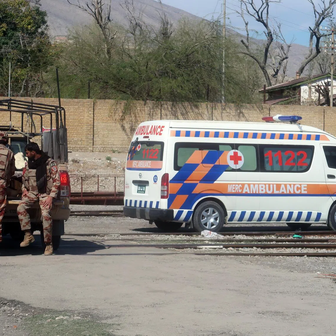Pakistani security officials secure Mach railway station in Mach, restive Balochistan province, Pakistan, on March 13, 2025.
