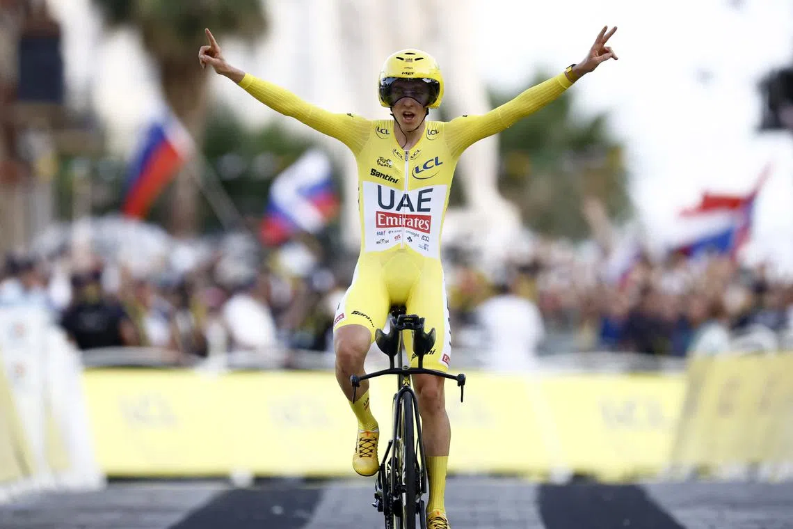 Cycling - Tour de France - Stage 21 - Monaco to Nice - Monaco, France - July 21, 2024 UAE Team Emirates' Tadej Pogacar celebrates winning stage 21 and winning the Tour de France REUTERS/Stephane Mahe
