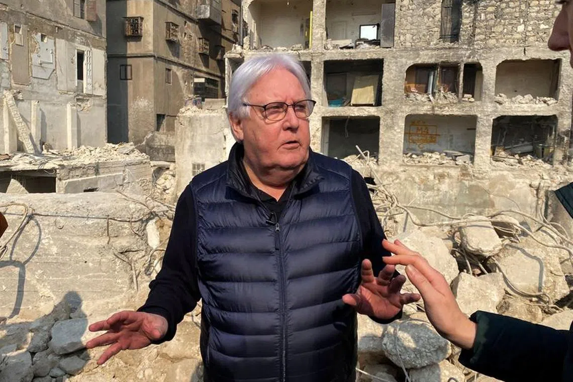 United Nations (UN) Under-Secretary-General for Humanitarian Affairs and Emergency Relief Coordinator Martin Griffiths gestures as he stands near damaged buildings, in the aftermath of a deadly earthquake, in Aleppo, Syria February 13, 2023. REUTERS/Firas Makdesi/File Photo
