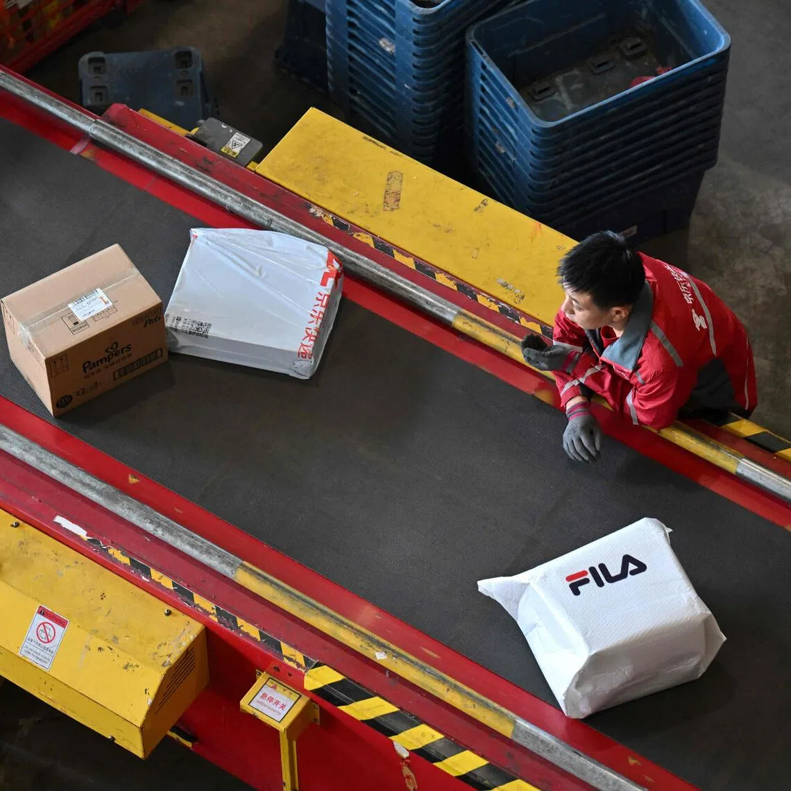 A worker sorting packages at JD.com’s warehouse in Beijing on Nov 11.