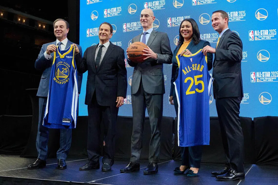 NBA commissioner Adam Silver (centre) posing for a group photo with Golden State Warriors co-executive chairman and CEO Joe Lacob (from left), Warriors co-executive chairman Peter Guber, San Francisco Mayor London Breed, and Warriors president and CEO Brandon Schneider during a press conference.
