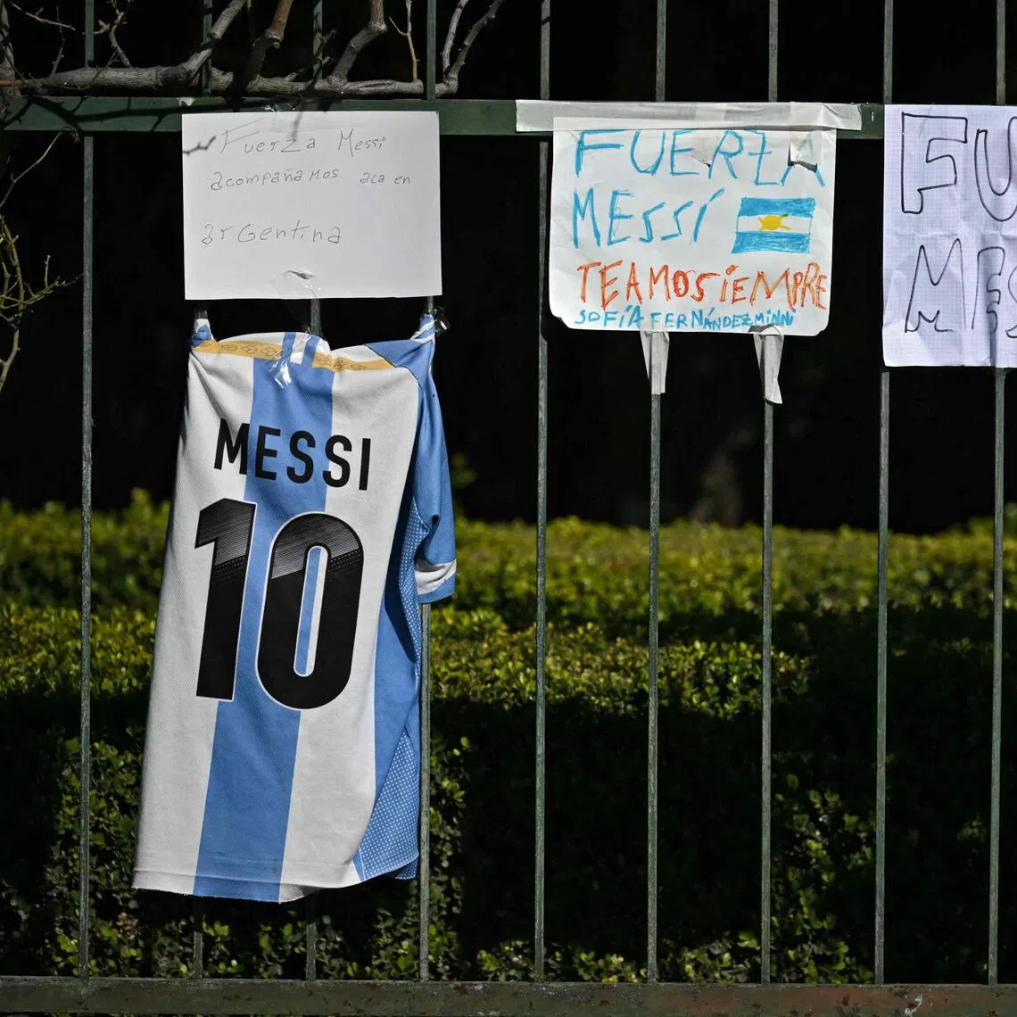 The gates of the town’s El Prado cemetery displayed a jersey and handwritten messages from fans, alongside signs reading “stay strong” on Aug 9.