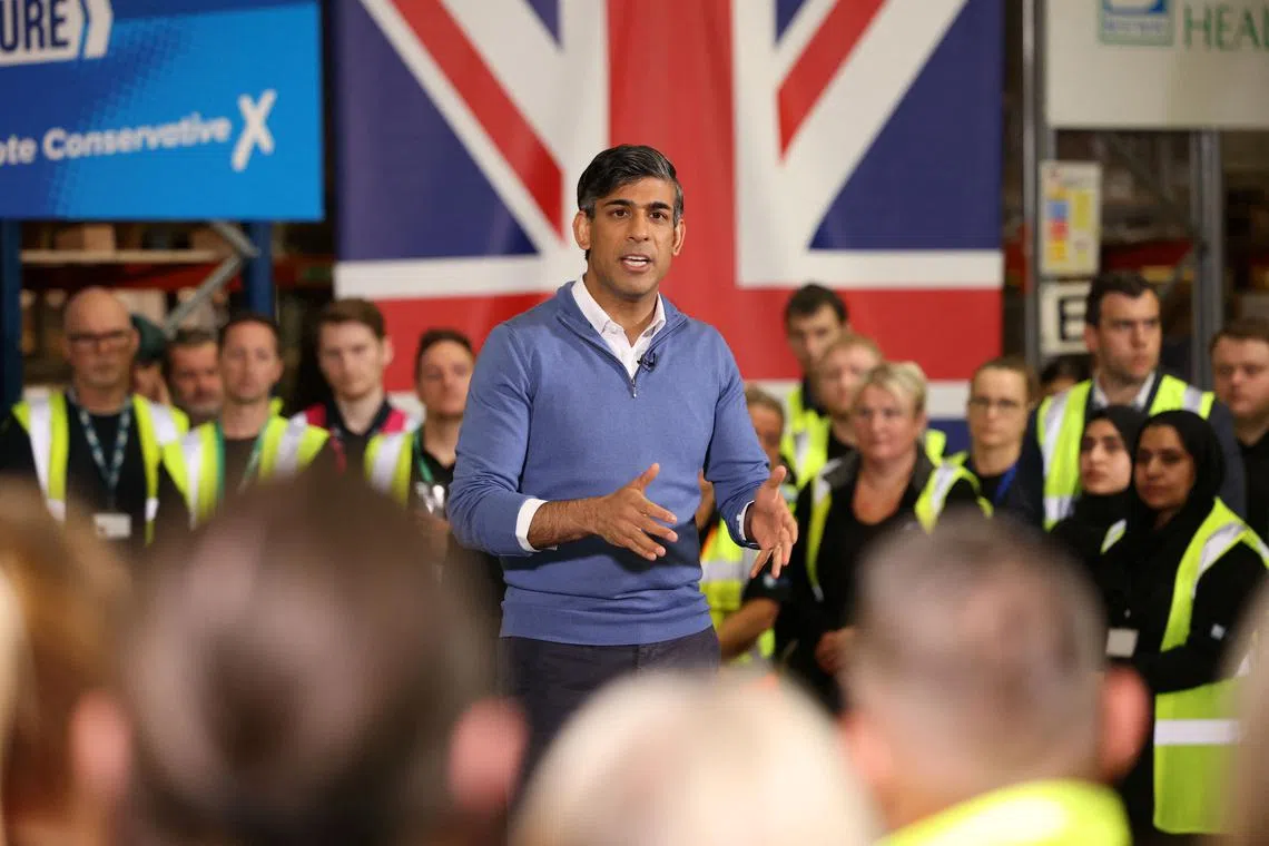 British Prime Minister Rishi Sunak holds a speech during his visit to the Well Healthcare Supplies as he campaigns in the Midlands, in Stoke, Britain, July 1, 2024. Dan Kitwood/Pool via REUTERS