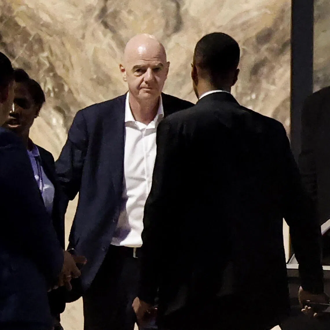 FIFA president Gianni Infantino (centre) leaves Al-Madina Stadium in Rabat following the 2026 Women’s Africa Cup of Nations match between Malawi and Zambia on Aug 5.