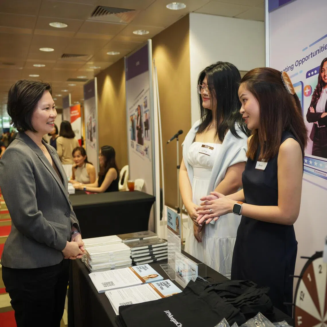 Minister of State for Foreign Affairs and Trade and Industry Gan Siow Huang visiting the JPMorgan Chase booth at Singapore Polytechnic’s Career and Further Education Fair on Oct 22.