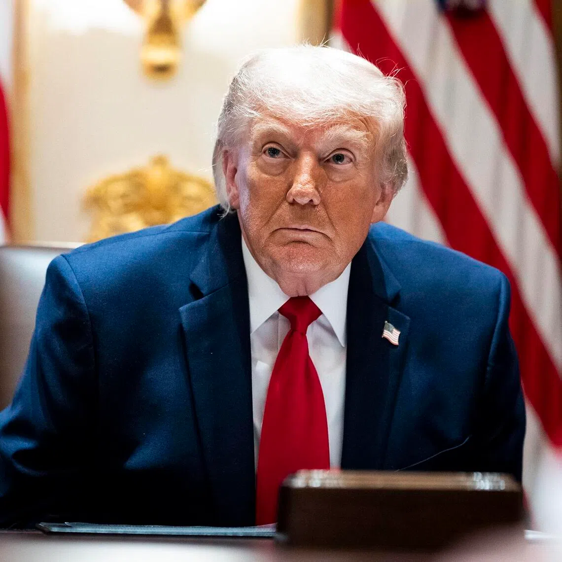 US President Donald Trump makes remarks during a meeting with his Cabinet in the Cabinet Room of the White House in Washington on May 27.