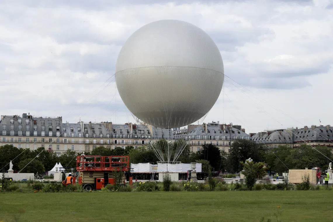General view of the Olympic cauldron outside the Tuileries Garden.