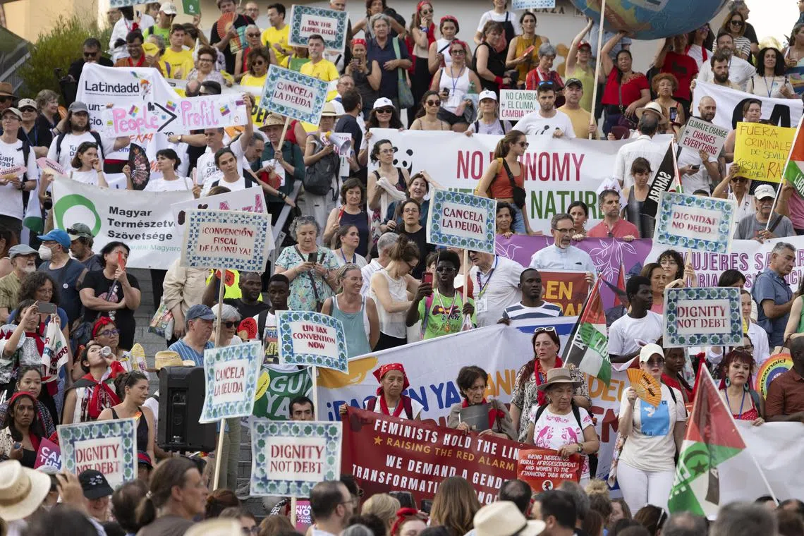 Hundreds take to the streets of Seville on 30 June 2025, in a powerful march led by global justice movements, demanding debt cancellation, climate finance, and democratic reform of global economic systems.   