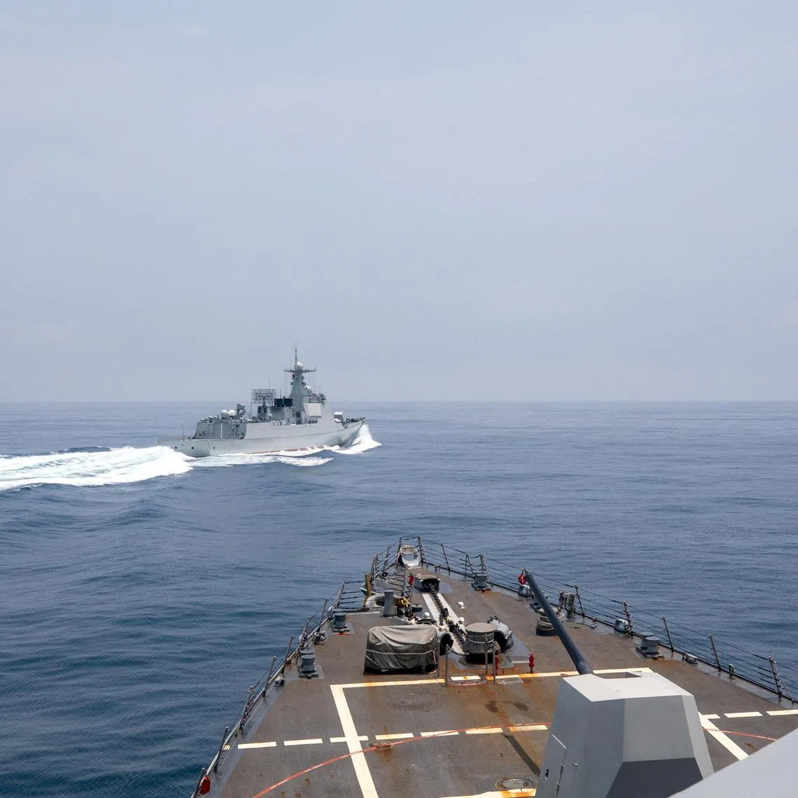 A file photo taken on June 3, 2023 shows a Chinese Luyang III class warship sailing as seen from the deck of a US destroyer in the Taiwan Strait.