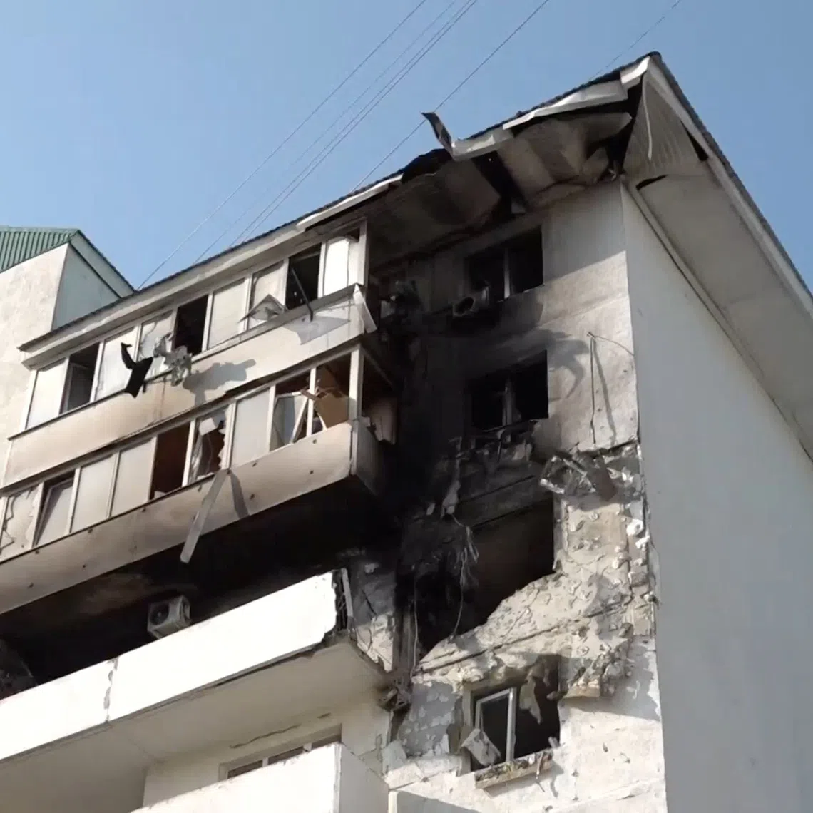 A damaged apartment building following an overnight attack, what local authorities called a Ukrainian drone strike, in the course of the Russia-Ukraine conflict in Novorossiysk, Russia, in this still image taken from video released on August 12, 2026.  Operations Headquarters of Krasnodar Region/Handout via REUTERS
