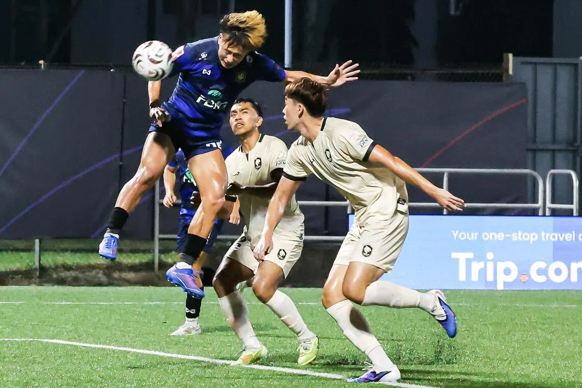 Tampines Rovers forward Hide Higashikawa (left) heading home his team’s opening goal during their Singapore Premier League match against Tanjong Pagar United at Jurong East Stadium on Oct 11.