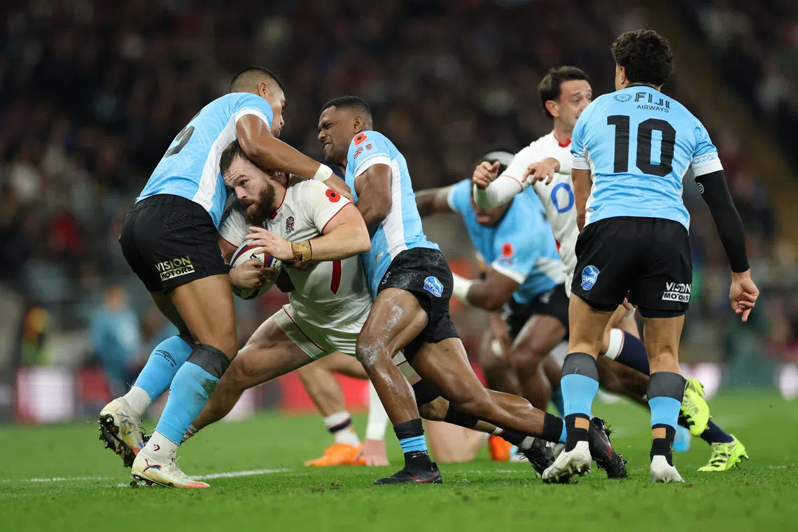 Rugby Union - Autumn Internationals - England v Fiji - Allianz Stadium, Twickenham, London, Britain - November 8, 2025 England's Luke Cowan-Dickie in action with Fiji's Salesi Rayasi Action Images via Reuters/Andrew Boyers