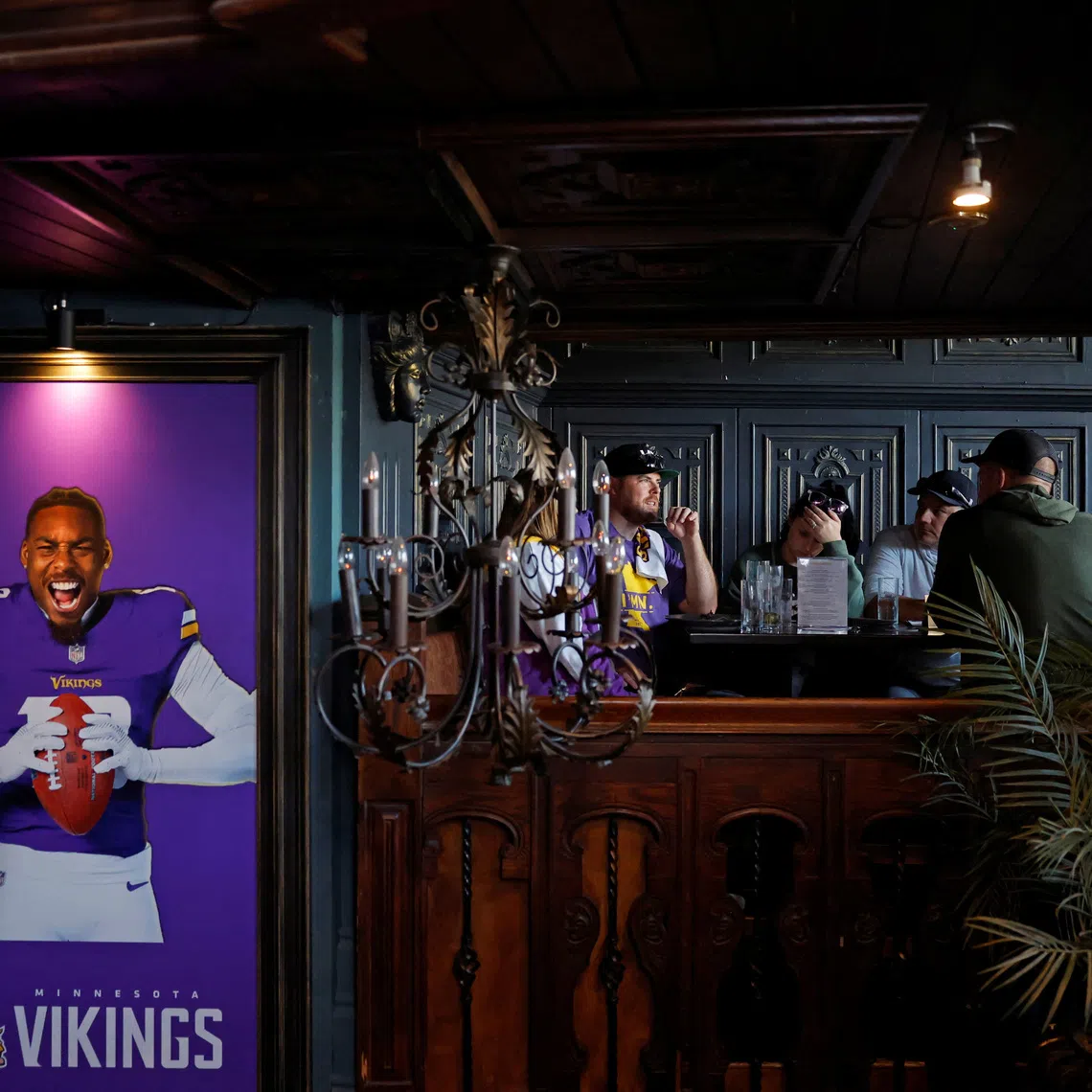 American football Vikings fans enjoy themselves in a pub ahead of the NFL's first-ever Irish regular-season game with Pittsburgh Steelers versus Minnesota Vikings to play in Croke park, in Dublin, Ireland September 26, 2025. REUTERS/Clodagh Kilcoyne