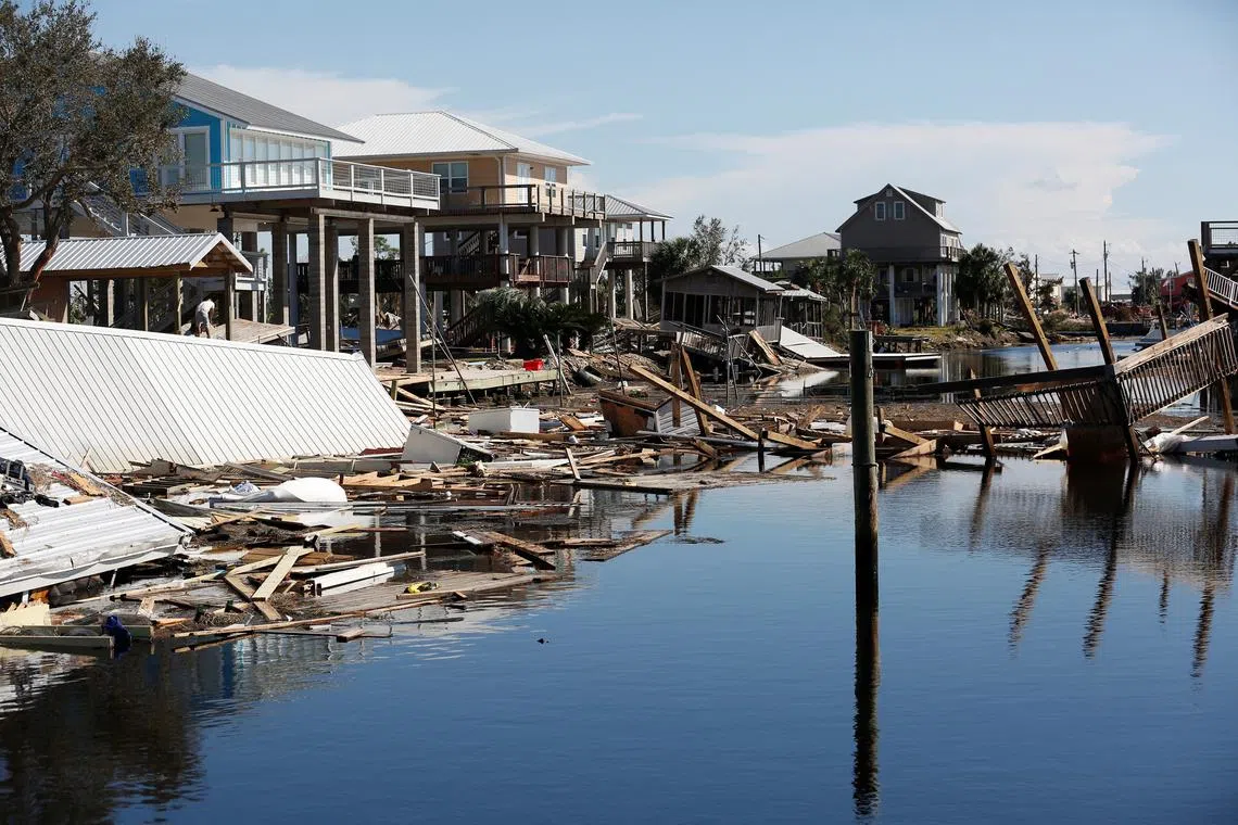 FILE PHOTO: Debris lies where homes were destroyed after Hurricane Helene passed through the Florida panhandle, severely impacting the community in Keaton Beach, Florida, U.S., September 29, 2024. REUTERS/Octavio Jones/File Photo