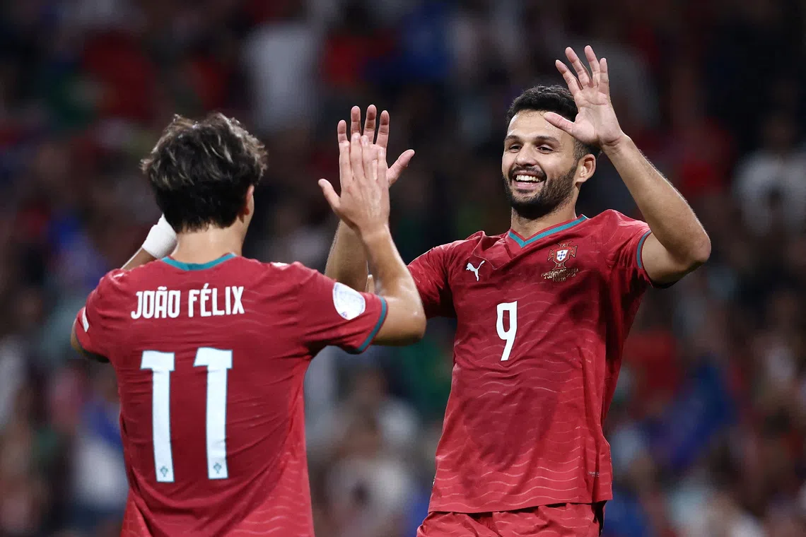 Portugal’s Goncalo Ramos (right) celebrate with teammate Joao Felix after scoring a goal against Norway in the Group A4 clash.