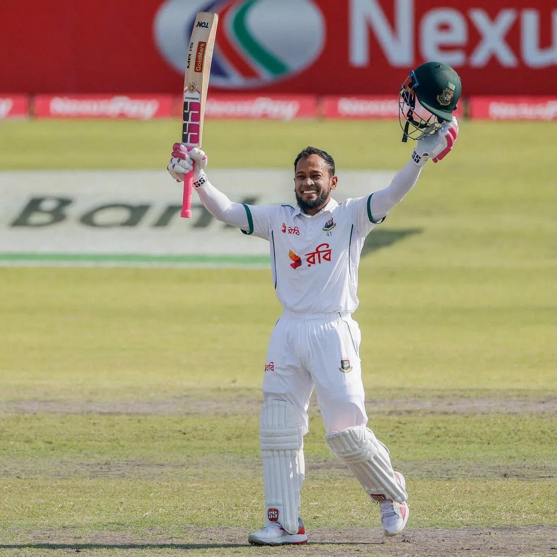 Bangladesh's Mushfiqur Rahim celebrates his century on the second day of the second Test against Ireland at the Sher-e-Bangla National Cricket Stadium in Dhaka on Nov 20, 2025.
