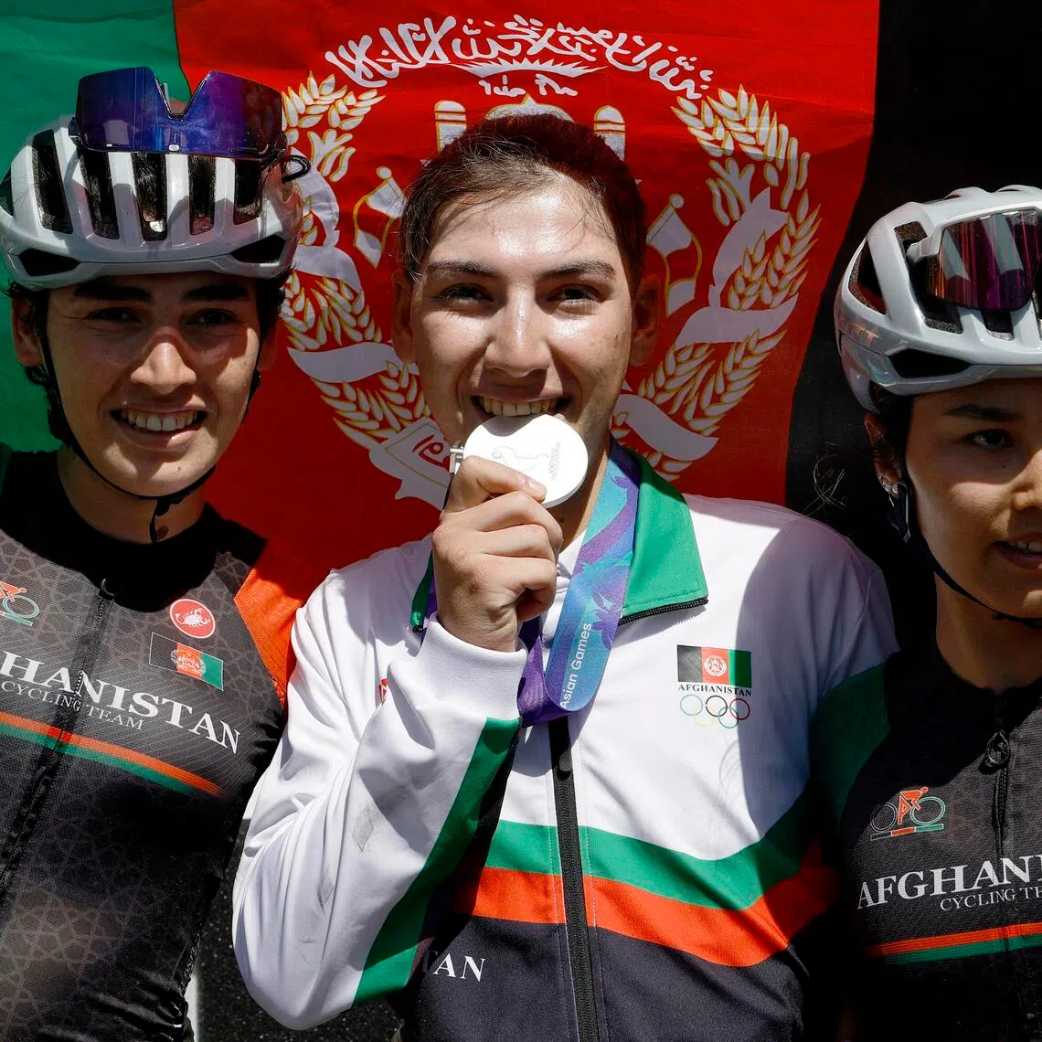 Italy-based Fariba Hashimi (centre) powered home second in the women’s road race near Nagoya in Japan, calling the triumph “something special”.